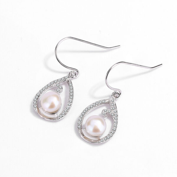 Teardrop Shaped Contour Hanging Pearl Earrings - Image 3