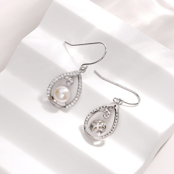 Teardrop Shaped Contour Hanging Pearl Earrings - Image 6