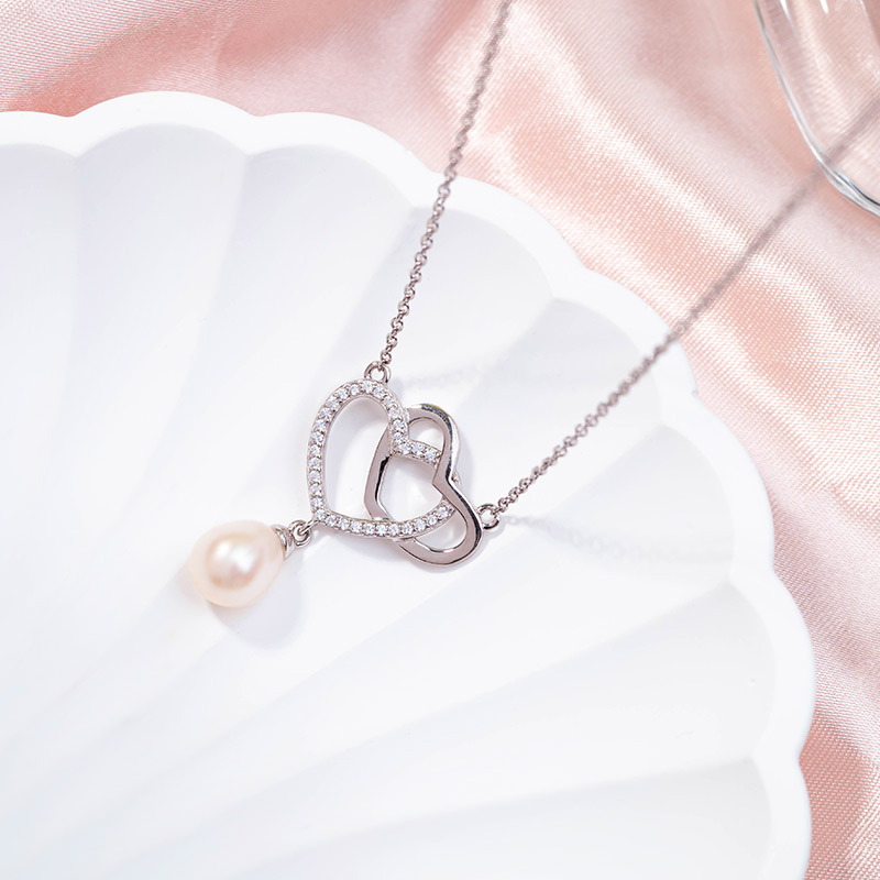 Pearl Necklace with Two Interlocking Hearts - Image 4